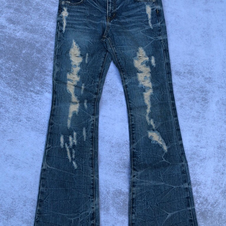 Colza Ripped Flare Jeans