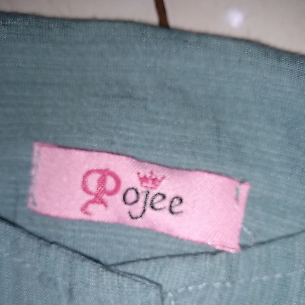 Atasan wanita merk Pojee