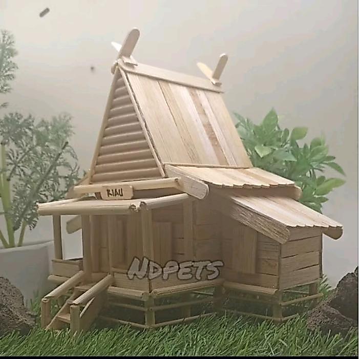 ` miniatur rumah adat Riau stik es krim