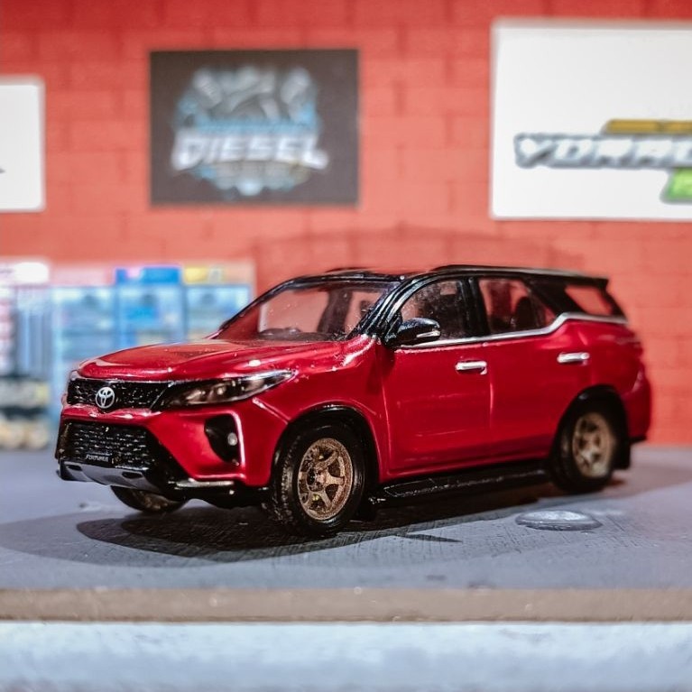 Fortuner para 64 merah