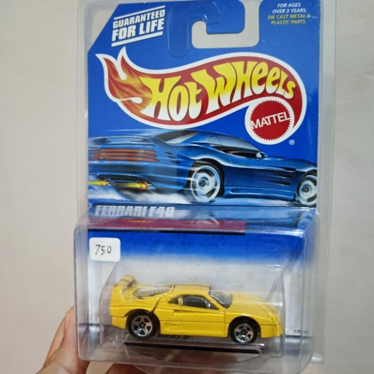 Hot Wheels Ferrari F40 Yellow by Larry Wood Blue Card 2000