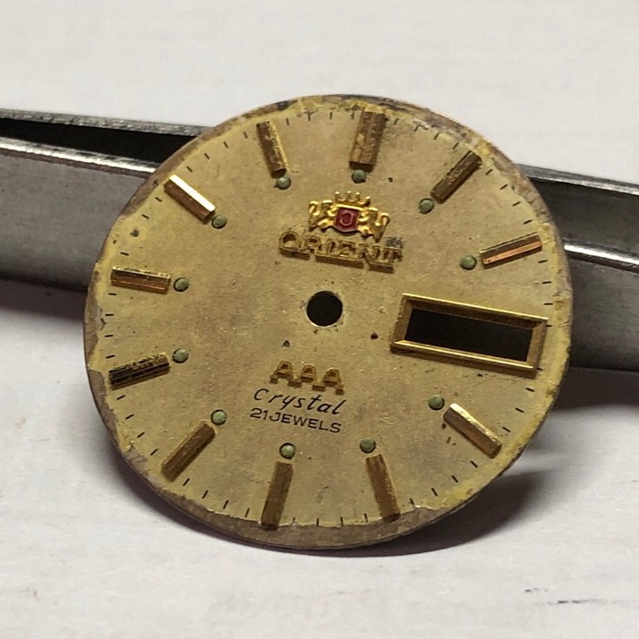 dial jam orient kuning aaa