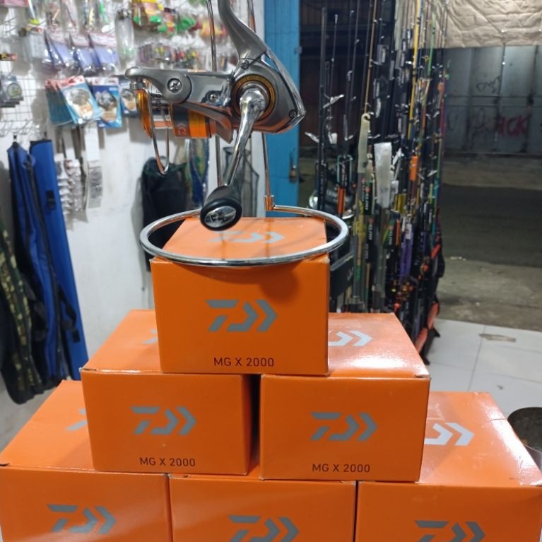 reel DAIWA MG X 2000 2500 30000