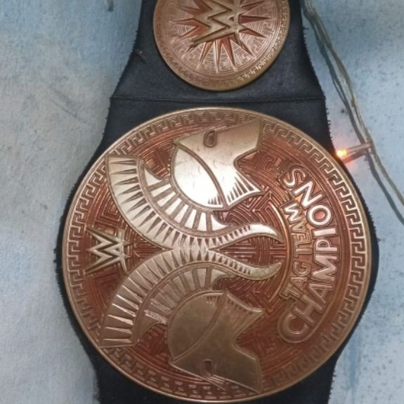 SABUK WWE JAKS original. kids size velcro tag team champions 2014 190rb