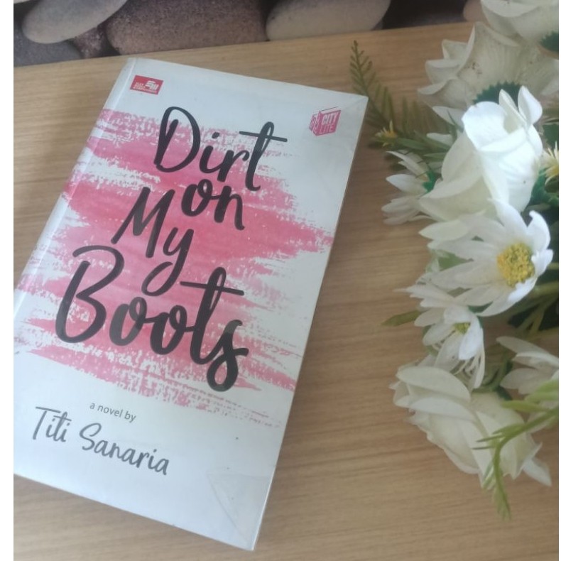 Preloved novel Dirt on my boots By Titi Sanaria