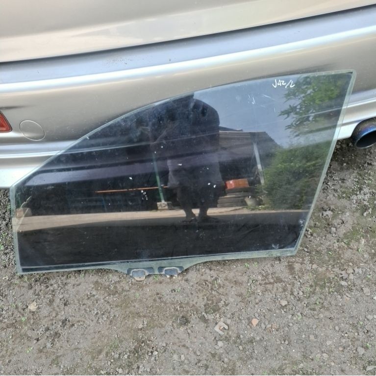 kaca pintu depan kiri honda jazz gd3 original