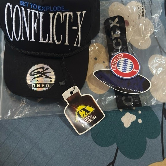 TOPI CONFLICT-X
