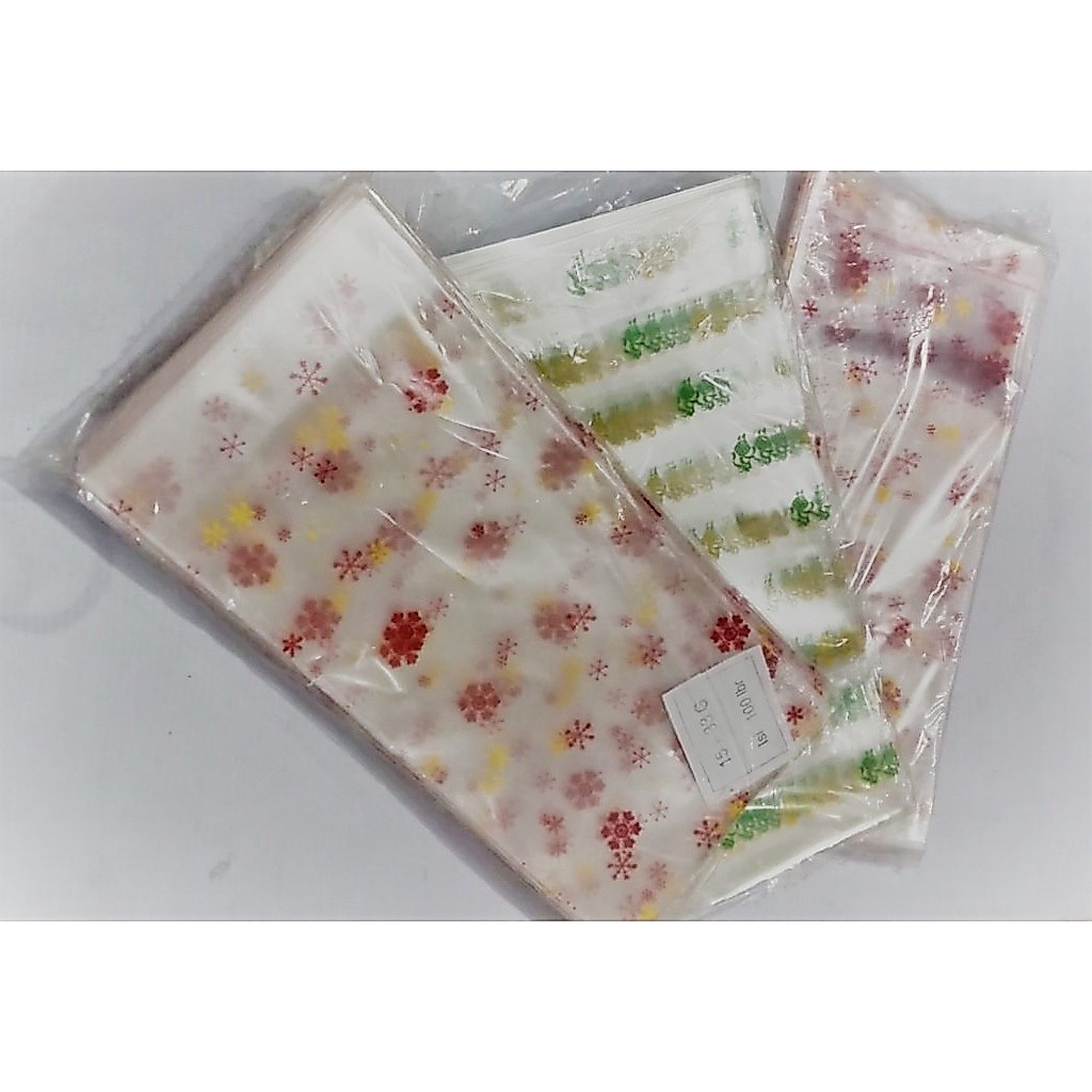 PLASTIK DUDUK OPP MOTIF UK. 15 x 33 / PLASTIK JAJAN LEBARAN ISI 100 PCS