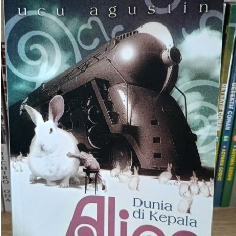 Dunia di Kepala Alice - Ucu Agustin