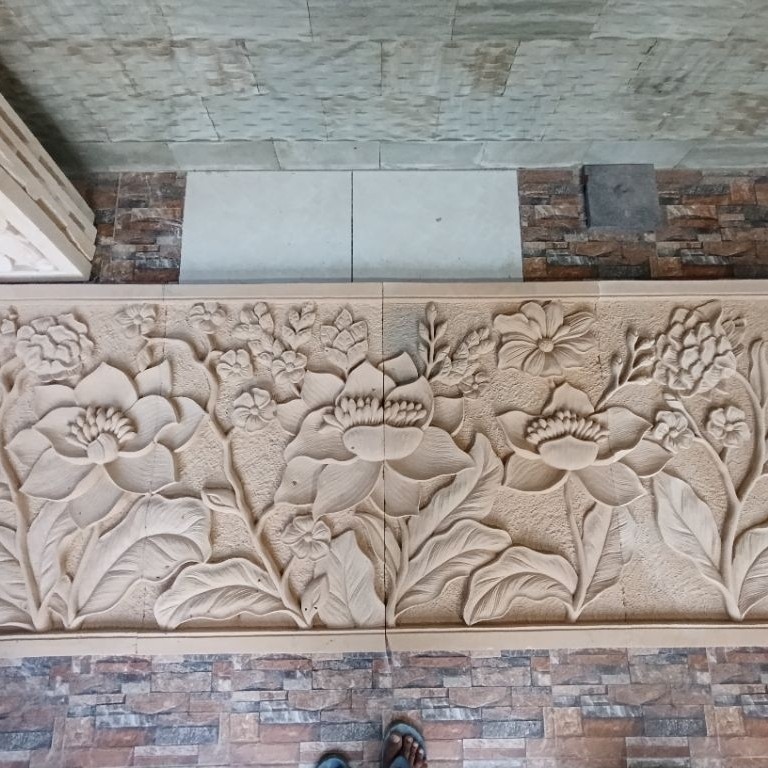 relief batu paras jogja motif bunga
