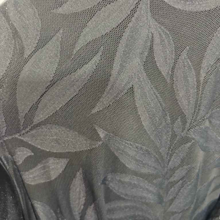 bahan atau kain tile spandek motif bunga atau kembang warna hitam