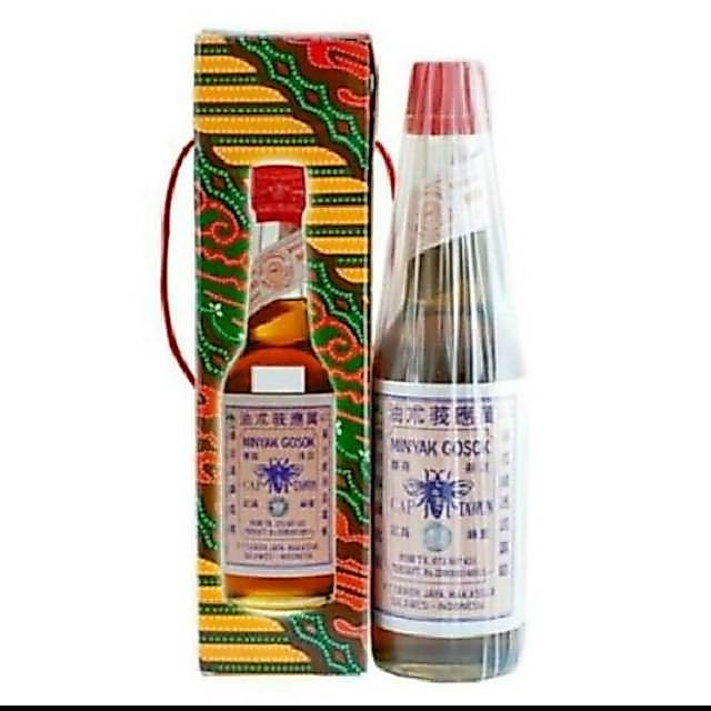 MINYAK TAWON GG 330ML/OBAT GOSOK TAWON BOTOL TUTUP MERAH /MINYAK TAWON MAKASSAR ASLI/TAWON GG 330ML 