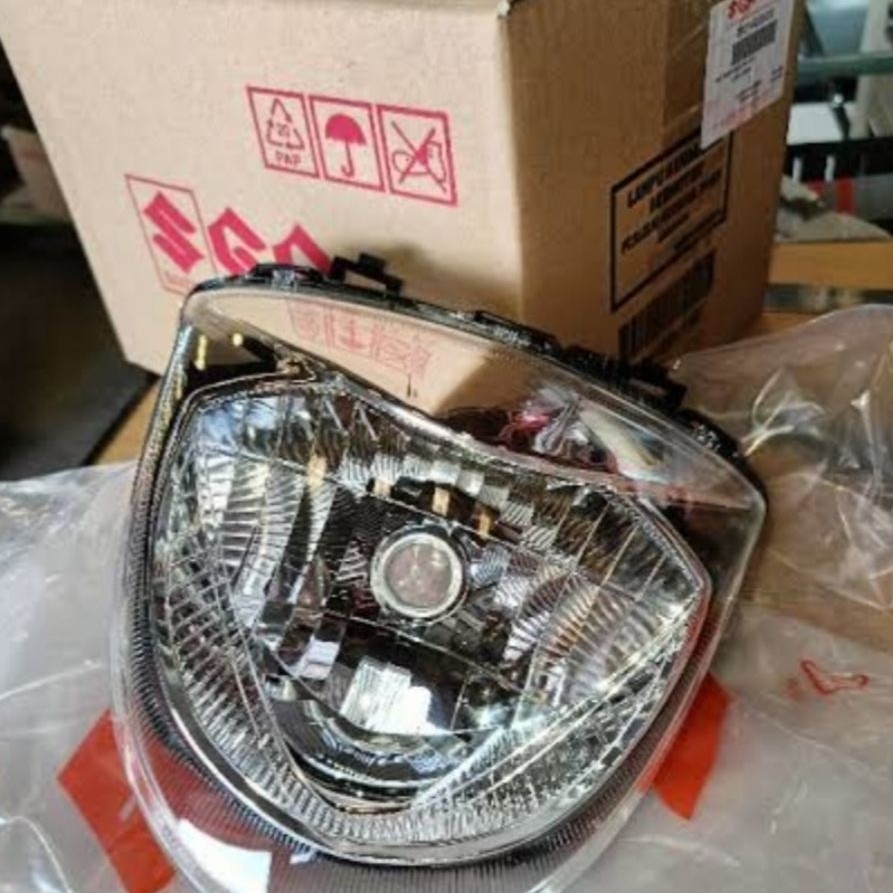 34121-40J reflektor mika lampu depan Suzuki address ori sgp