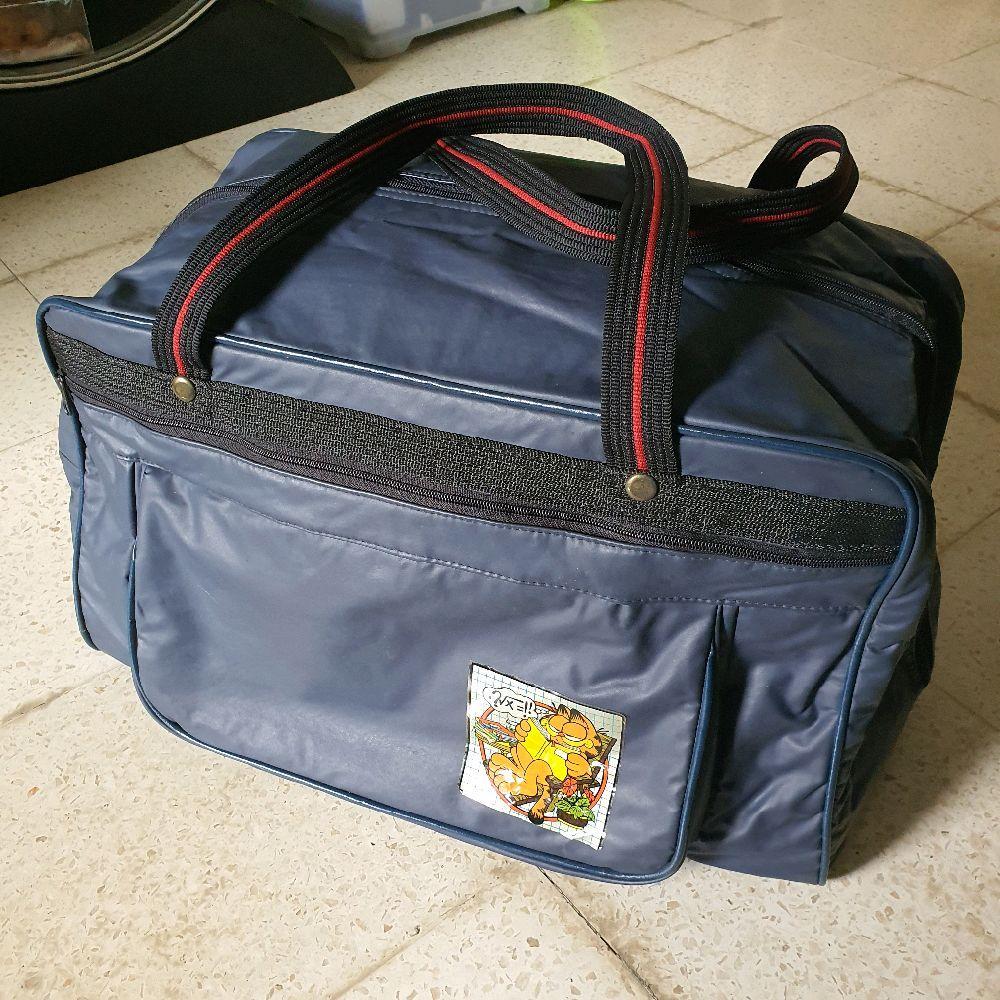 tas travel biru tua garfield bekas seken preloved Mudik