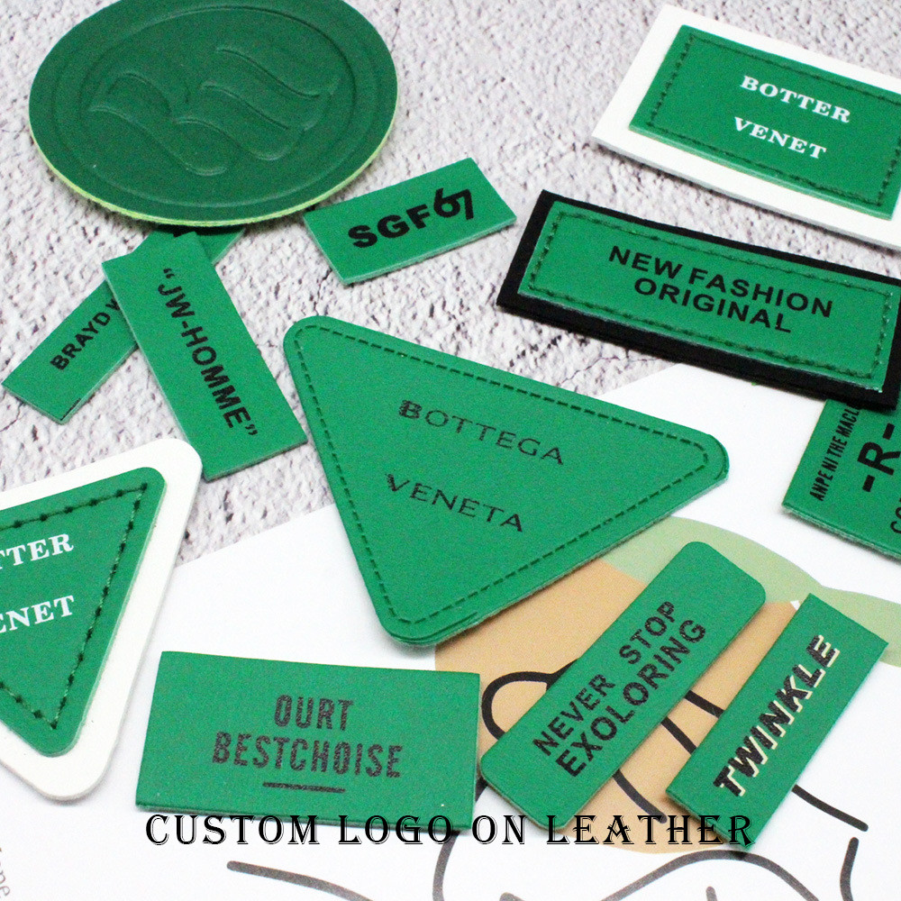 

custom embossed logo leather labels for clothing brand sewing label microfiber trademark labels for jeans toy gift