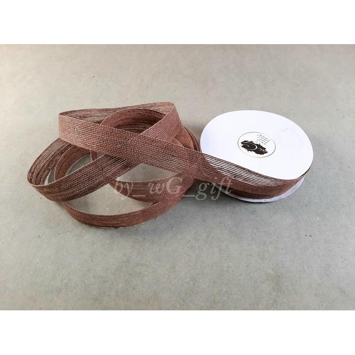 

Pita Goni Polos; Lebar 2.5 cm; Panjang 20 Yard - Coklat Tua