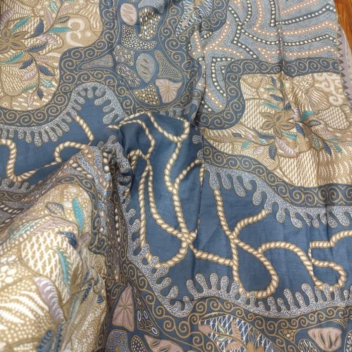 kain batik dobby kontemporer warna dasar biru muda