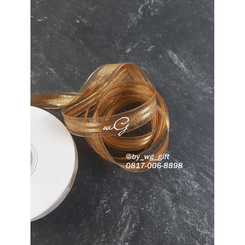 

Pita Organdi - Coklat; Lebar 1.8cm; Panjang 25 Yard