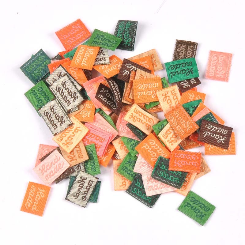 

11x15mm Colorful Labels Sewing Supplies Handmade Clothing Tags Embossed Flag Label For DIY Garment Bags Accessories 100Pcs c2393