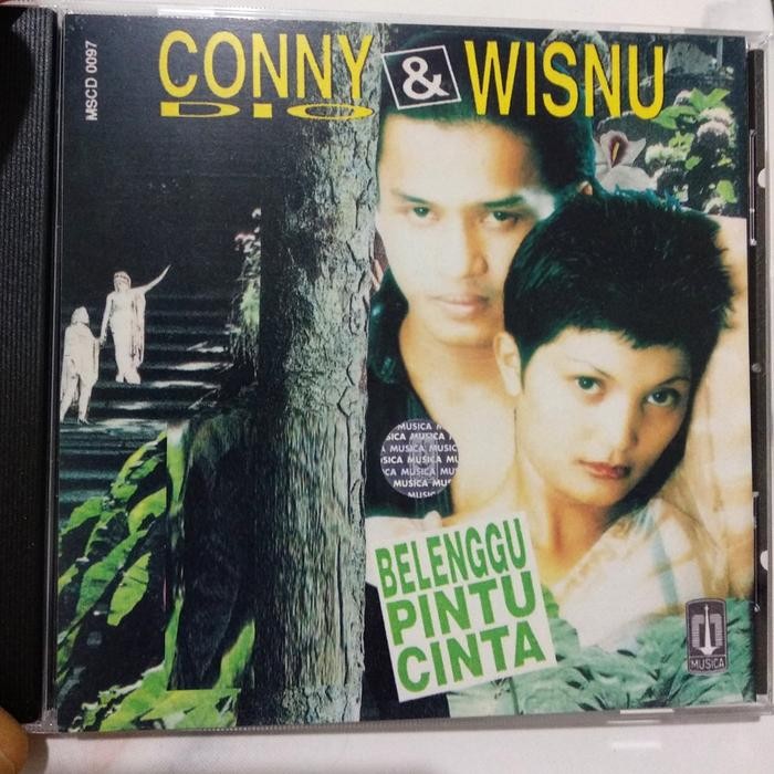CD conny dio & wisnu - belenggu pintu cinta. nicky astria nike ardilla