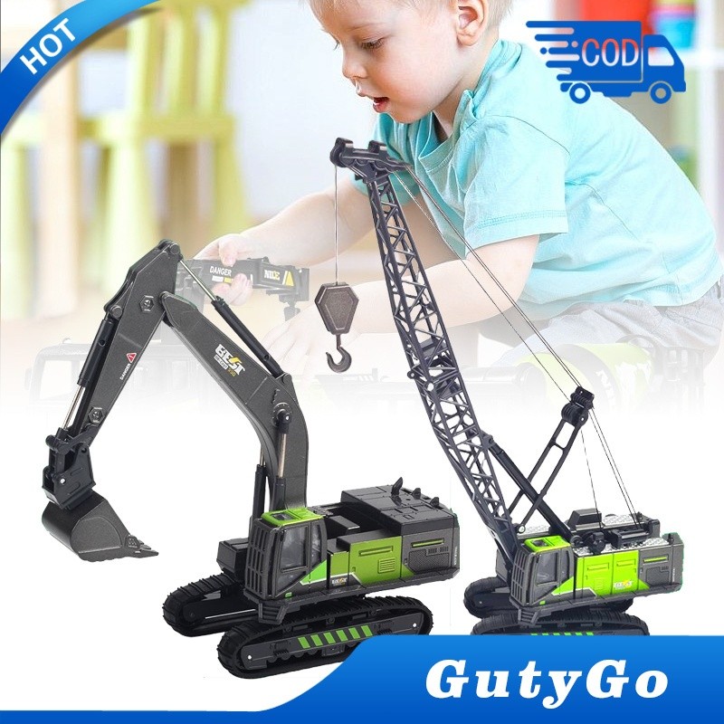 Mainan excavator miniatur