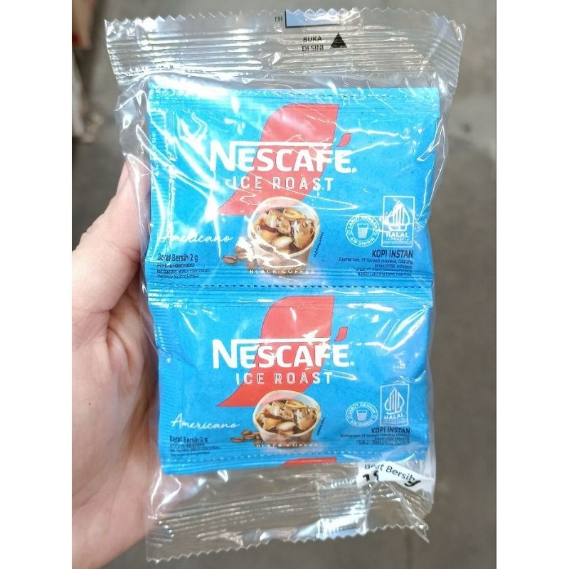 

Nescafe Ice Roast Americano 10x2gr Kopi Instant Nescafe Biru Sachet - AMY