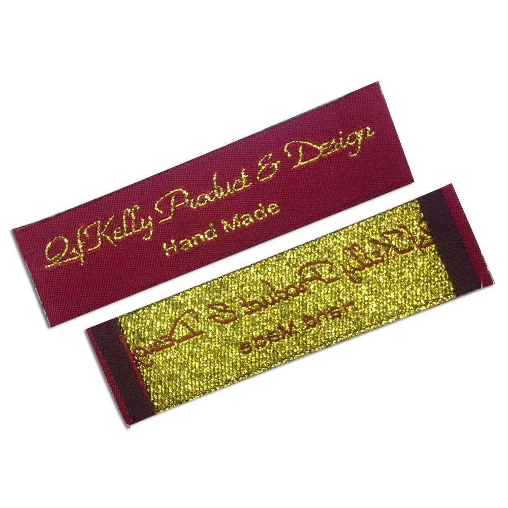 

Customized Satin Woven Labels For Clothing Silk Garment Tags Gold Metal Logo Custom Embroidered Label Handmade Fabric Tag