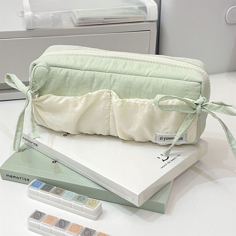 

Cloud toast, ribbon bow pencil case, white green color blocking, high-value student pencil case