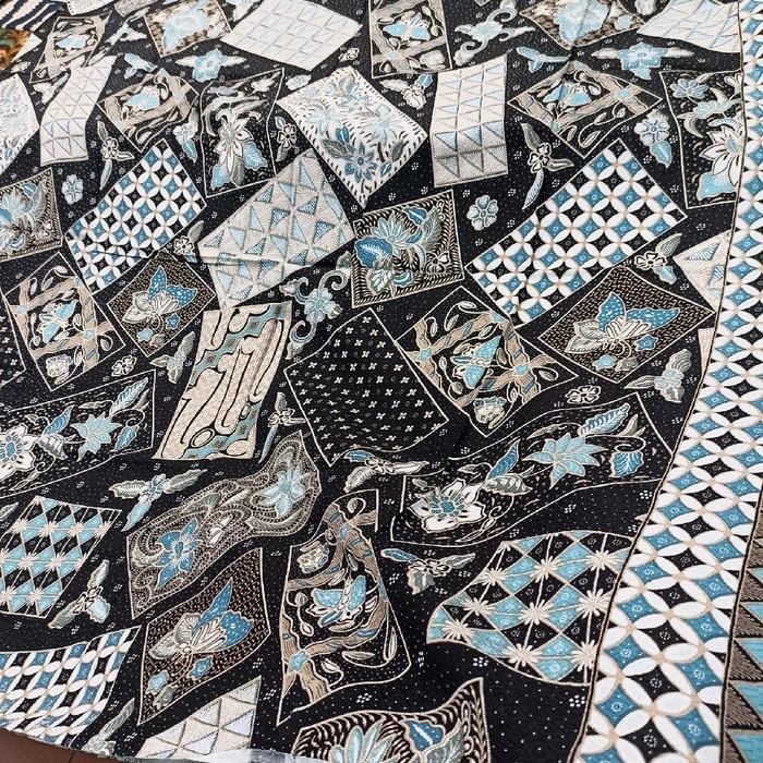 Kain batik dobby motif perca tambal seribu warna dasar hitam biru