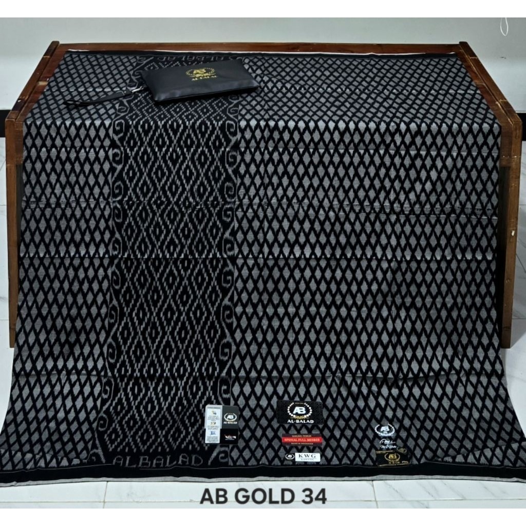SARUNG AL BALAD/ALBALAD/AL -BALAD GRADE GOLD MOTIP KAWUNG/KWG BAHAN MESRES JAHIT TENGAH (DOMPET) BIS