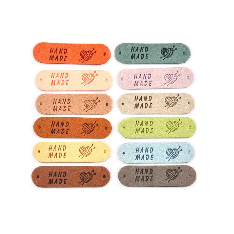 

20Pcs 4.5x1.2cm 15Colors Mixed Leather Embossed Labels Sewing Accessories 2holes Garment Tag Handmade DIY Clothes Material c4017