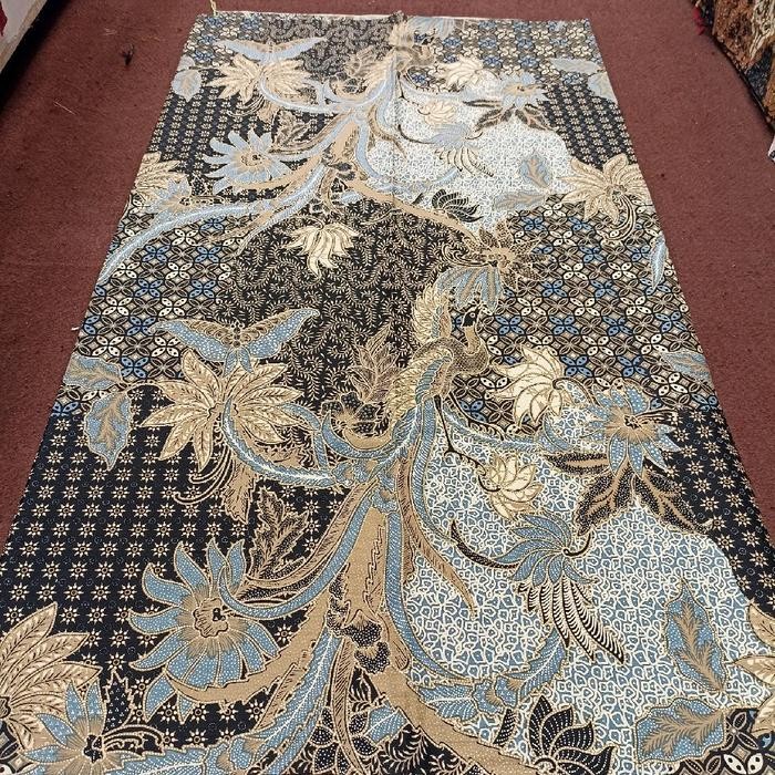 Kain batik warna biru indigo motif sekarjagat burung merak
