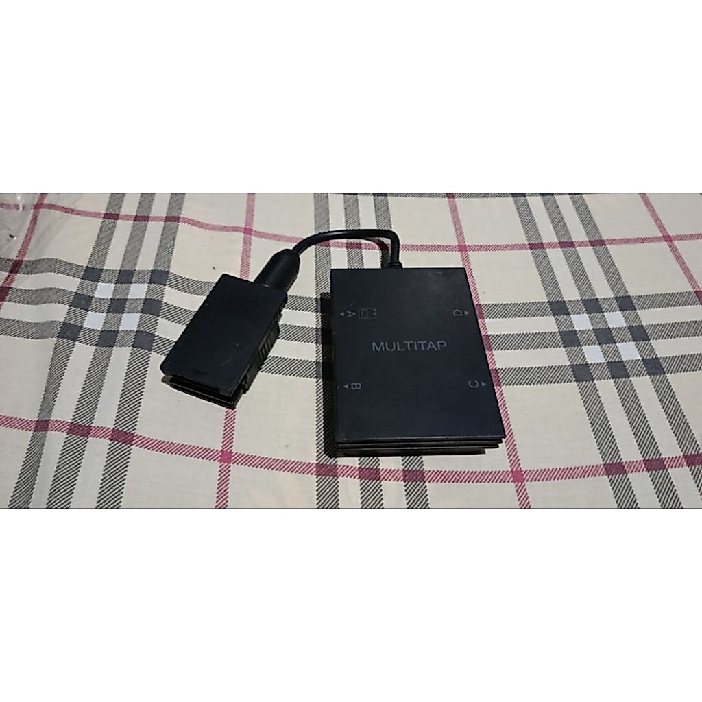 Multitap PS2 untuk main 4 player.