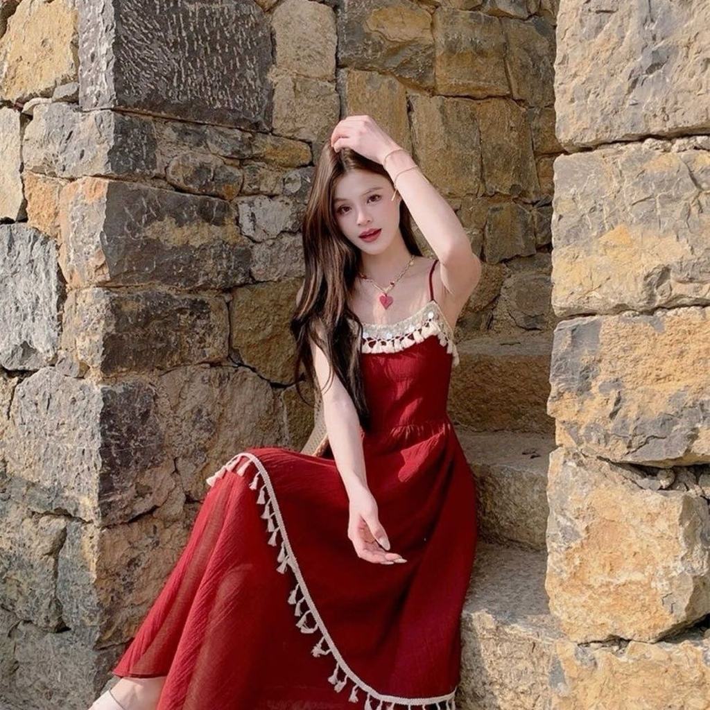 Crunchy Brulee Dress Wanita Spaghetti Strap Tassel Waist Fit Asymmetric Maxi Dress
