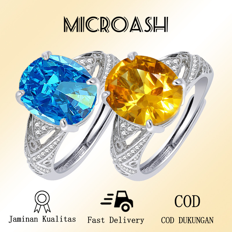 Cincin batu permata warna terbuka dengan berlian kuning telur merpati besar bertatahkan mewah dan mo