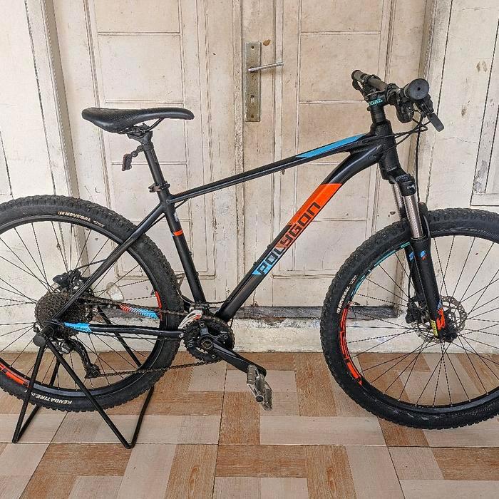 Polygon Sepeda Extrada 5 dengan Desain Hitam dan Oranye Menonjol