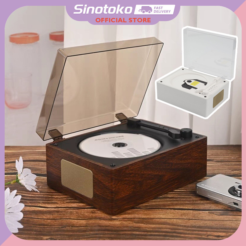 CD Player Bluetooth Speaker Desain Retro – Portabel, suara stereo jernih, tersambung via Bluetooth. 