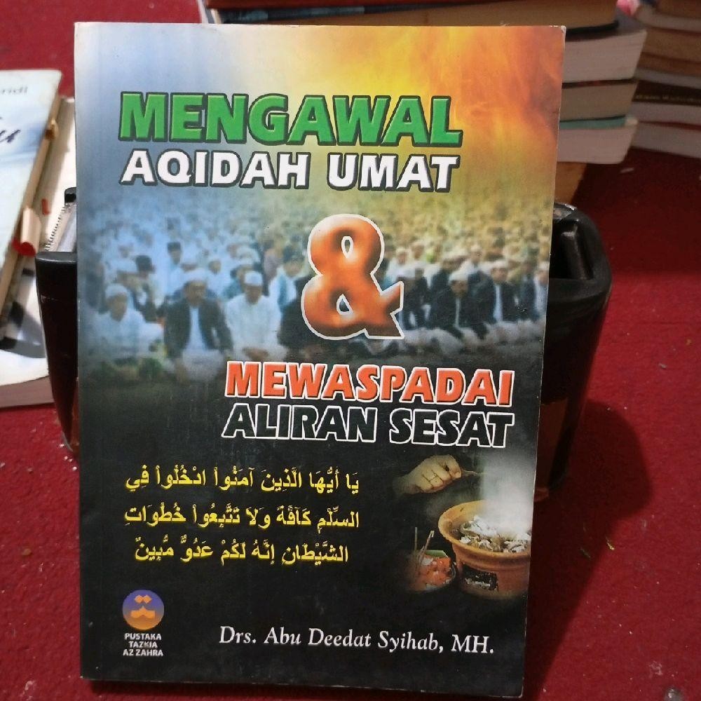 Mengawal aqidah umat & mewaspadai aliran Sesat by Drs. Abu deedat syihab, mh.