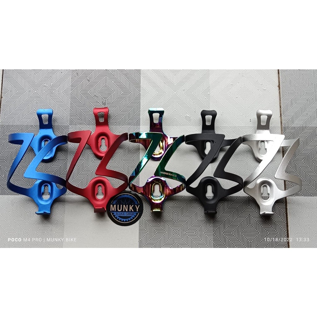 Foto Bottle cage tempat dudukan botol bidon alloy sepeda rainbow pelangi MTB seli RB