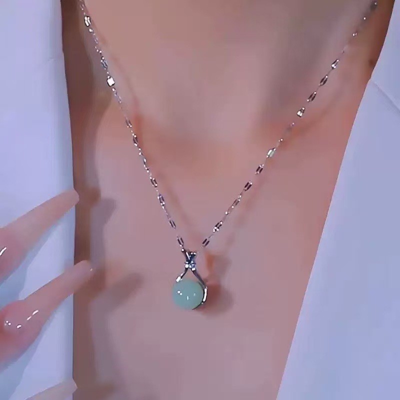 Titanium steel tas keberuntungan perak kalung liontin wanita