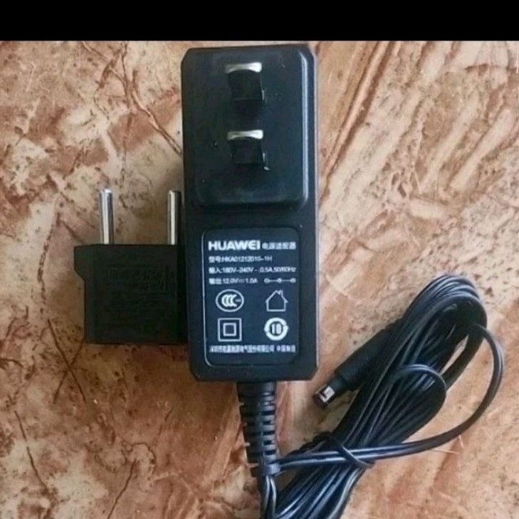 ADAPTOR  12v 1A + colokan  bekas  original copotan modem  bisa untuk zte/ Stb/cctv DLL