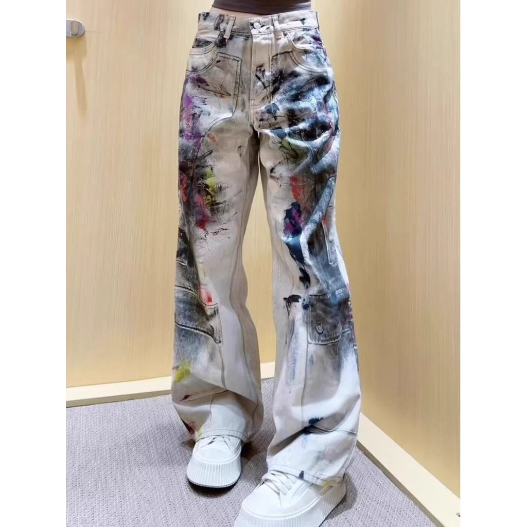 Celana jeans industri berat Amerika yang dicelup dan dicelup dengan tangan, celana kerja grafiti.