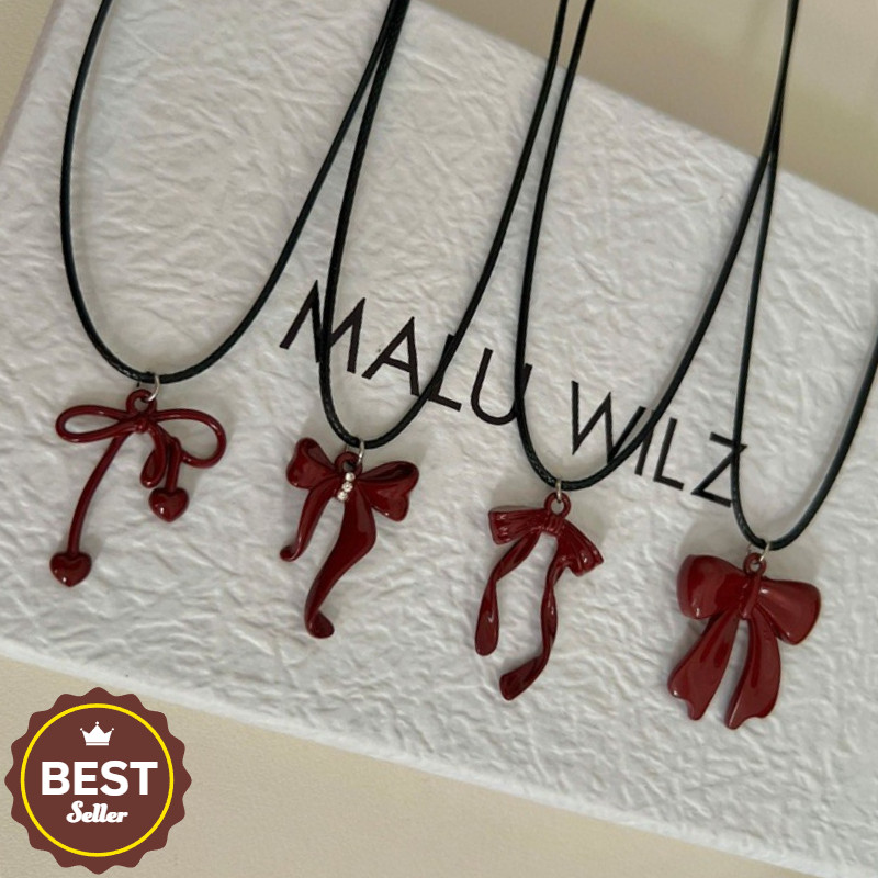 Kalung klavikula ankora merah vintage dengan tali kulit hitam: pilihan serbaguna untuk musim dingin 