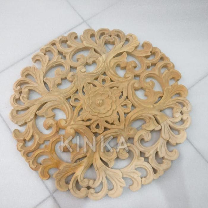 Ukiran kayu bulat bNs