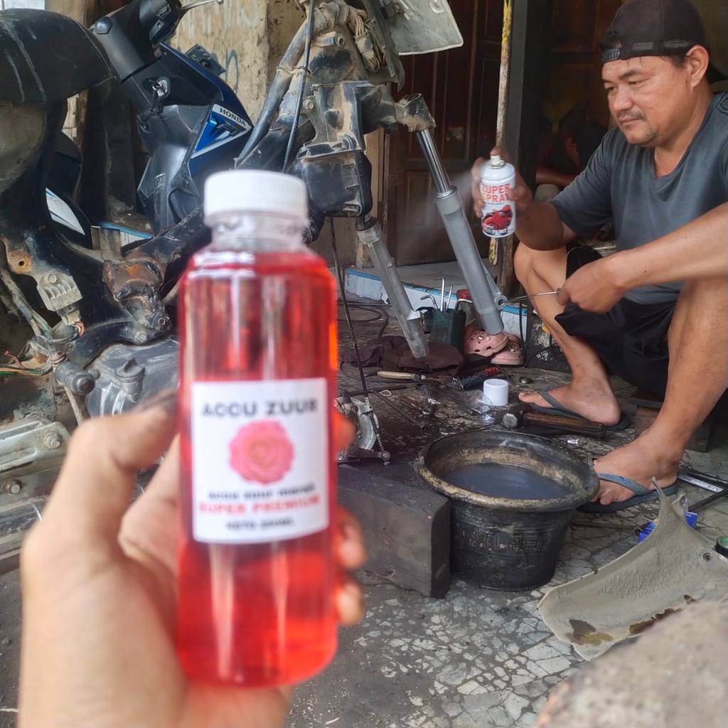 AMPUH Air aki merah. air aki buat nambah aki kering yang lemah dan soak (netto 250ml) Amira motor ai