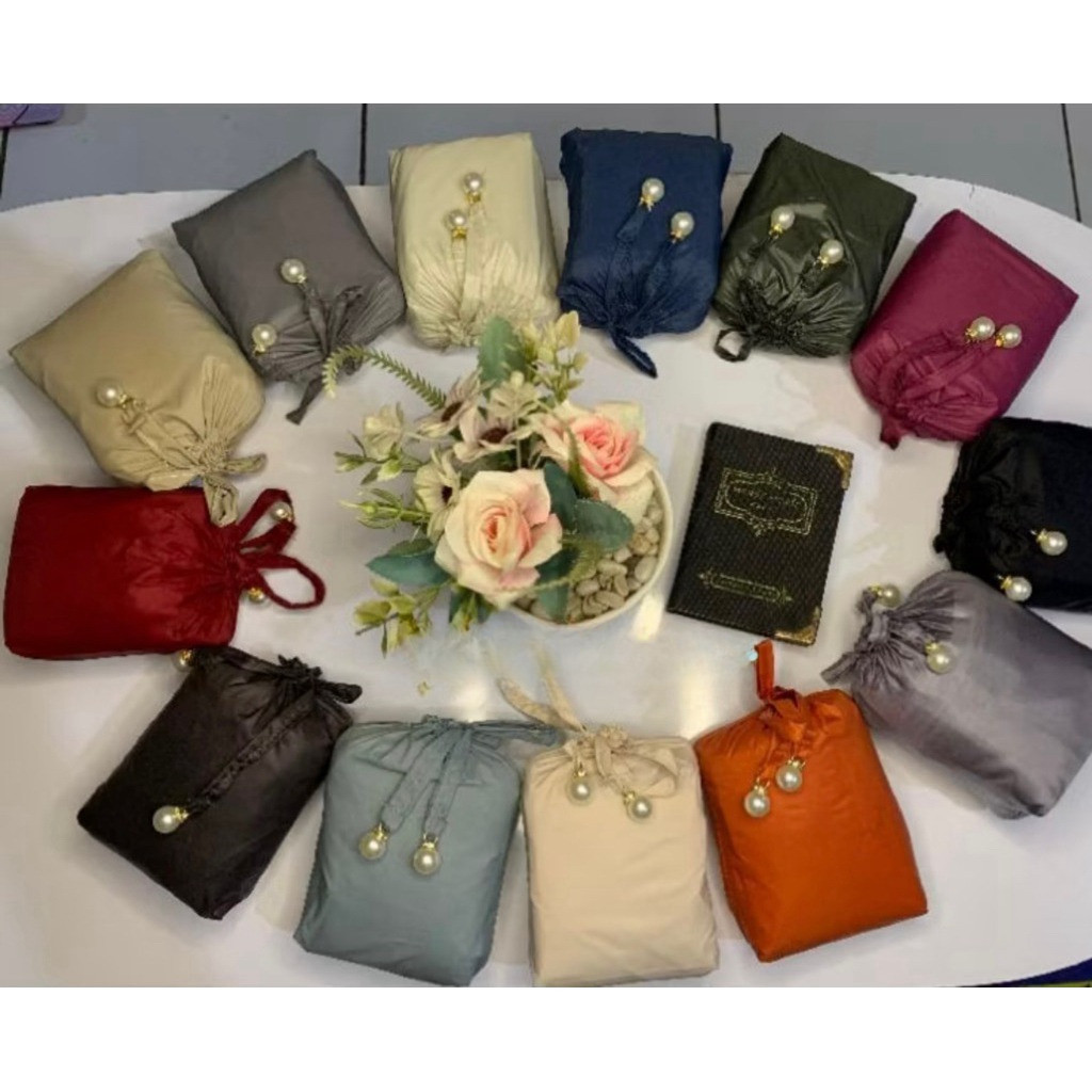 Grosir Mukena dewasa travelling mini pouch 2in1  Parasut isi 20 (1 kodi)