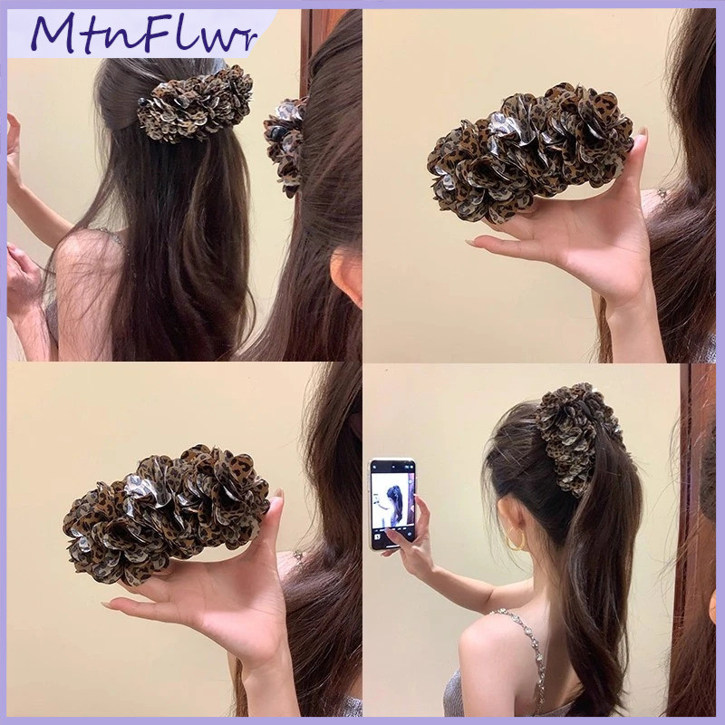 Aksen Rambut Mewah: Jepit Ukuran Besar Dengan Corak Eksotis Untuk Tatanan Sanggul Yang Elegan