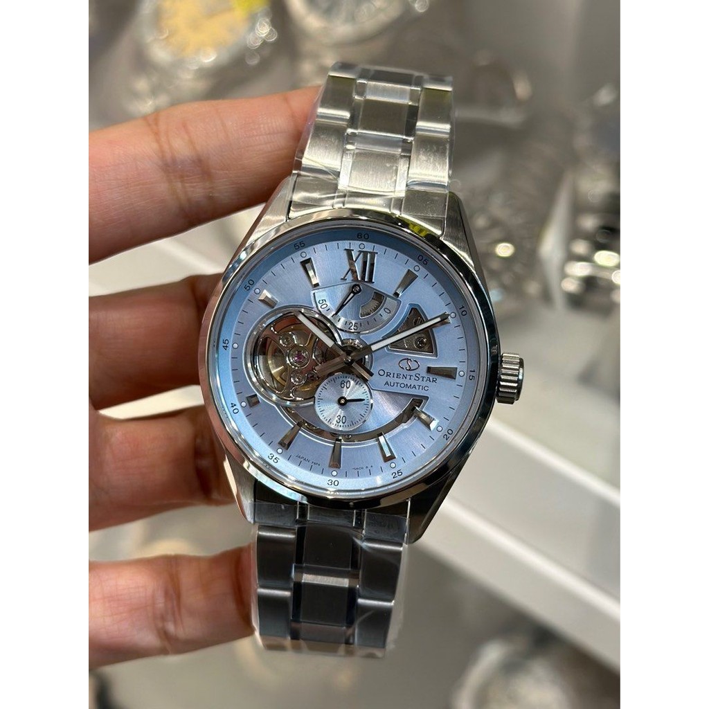 Original 100% Orient Star Contemporary RE-AV0127L Moving Blue Series Sky Blue Dial St. Steel Strap L