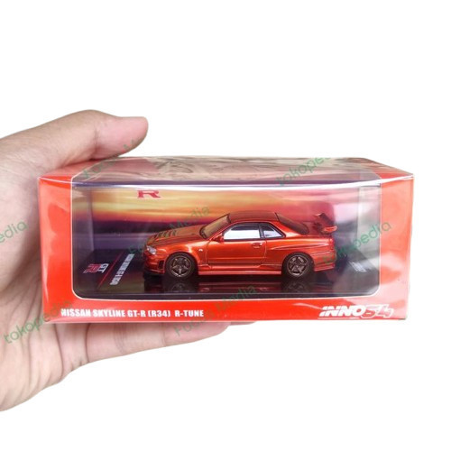 Diecast Nissan Skyline GTR R34 R-Tune Orange Metalic Inno64