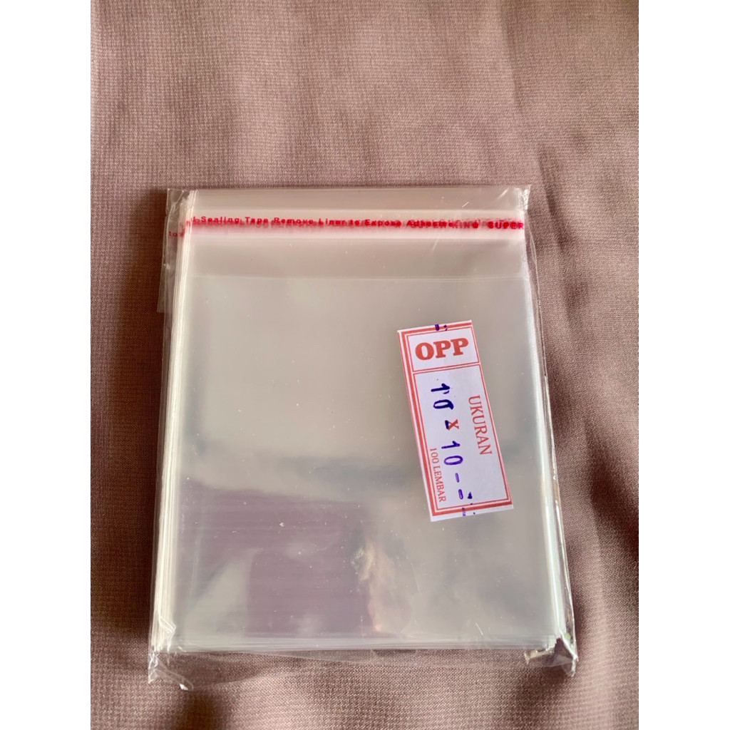 Plastik OPP Bening Uk. 10x10. Plastik OPP Lem Perekat Tebal 03. Plastik Kue/Souvenir/Aksesoris.